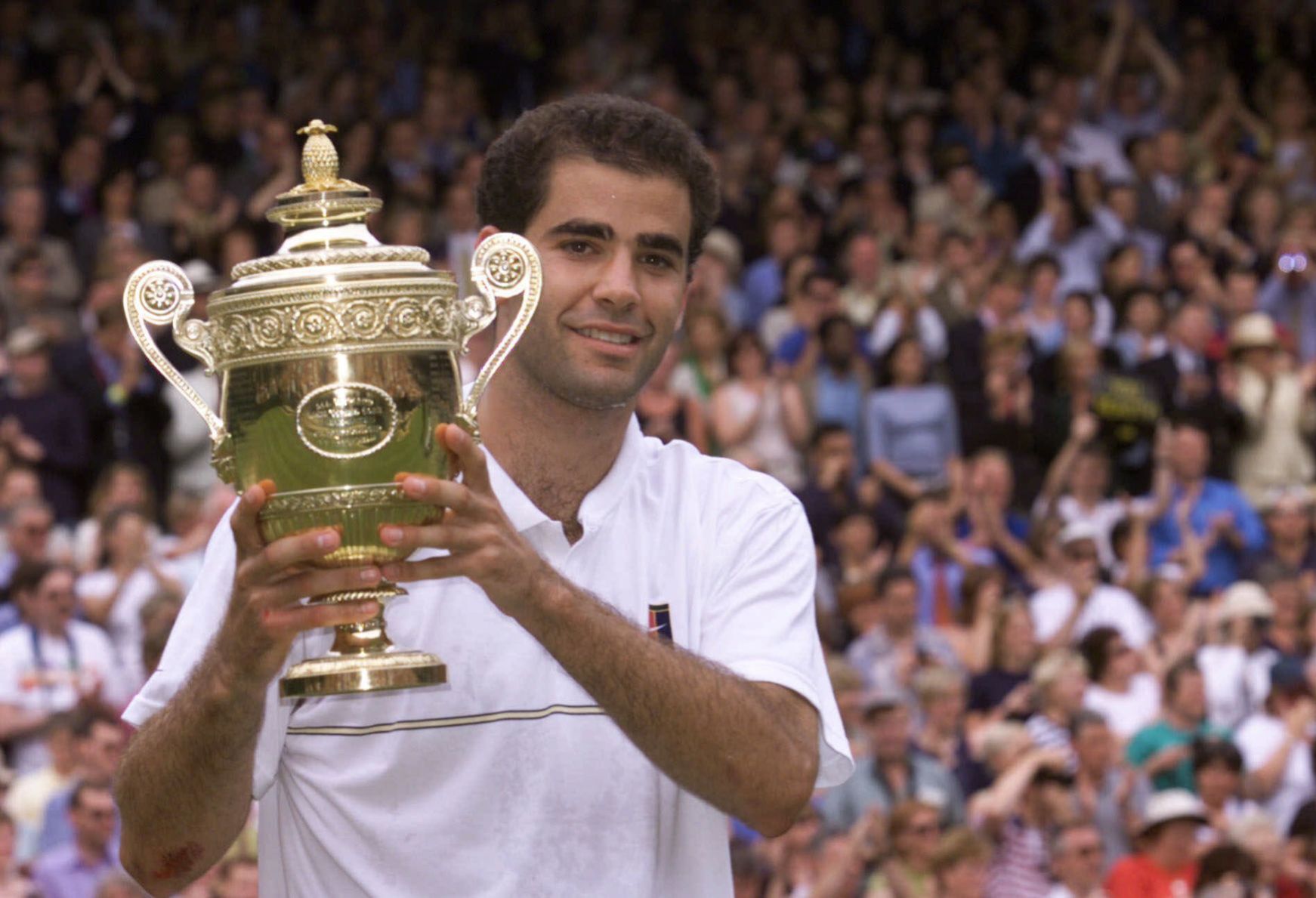 1999: Pete Sampras beats Andre Agassi to win Wimbledon, tie record for most Slam titles